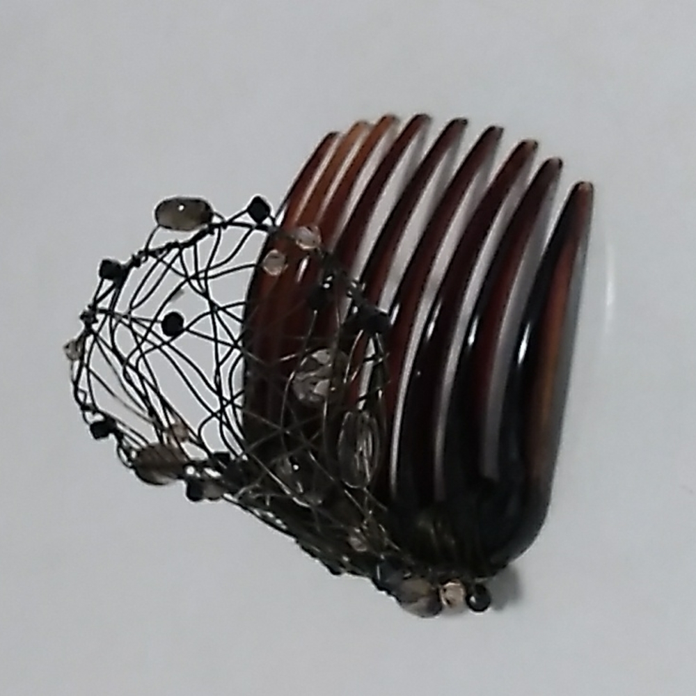 Colette Malouf comb